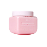 Pink jar of Derm Exfoliator with white lid on a white background