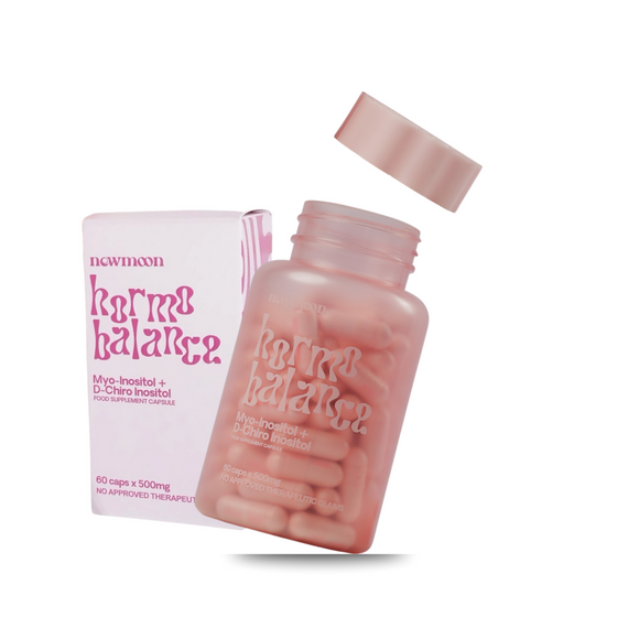 Pink bottle and packaging of 'horme balance' on a white background