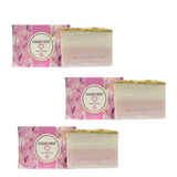 Three packaged bars of G21 Golden Dust Glass Skin Soap with floral designs on the packaging, indicating a pinkish color and a weight of 135g each.