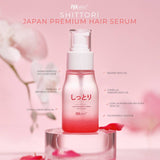 Shittori Japan Premium Hair Serum bottle with ingredients listed on a pink background